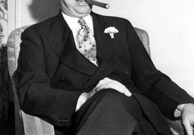 attorney-general-tom-c-clark-seated-smoking-cigar-889d89-1024