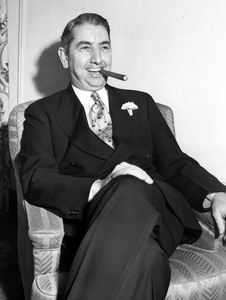 attorney-general-tom-c-clark-seated-smoking-cigar-889d89-1024